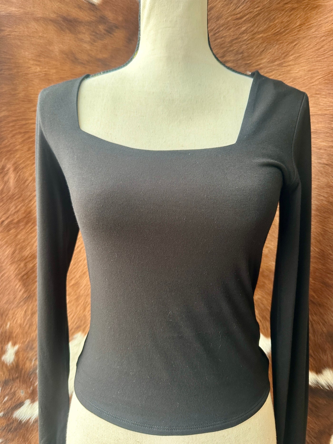 Double-lined square-neck top for extra coverage and a smooth fit.