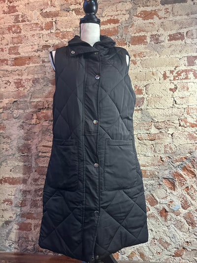 Front view of our Halsey Long Puffer Quilted Vest [Black] on a mannequin.