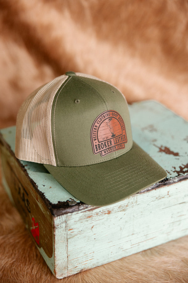 The custom leather patch hat for Broker Leather called the Head Nod Broker Patch Hat in Olive Green.