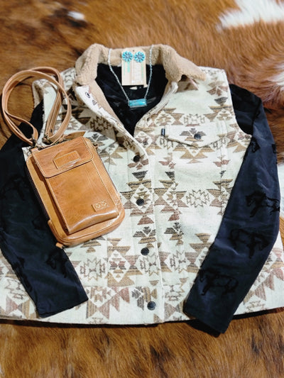 The Hooey Binx Mommy-n-Me Vest shown with Authentic Turquoise jewelry and a Bed|Stu handbag.