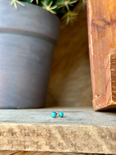 Ikea Tiny Authentic Turquoise Stud Earrings, handcrafted by Navajo artist Linda Yazzie, with 4mm turquoise stones set in sterling silver.