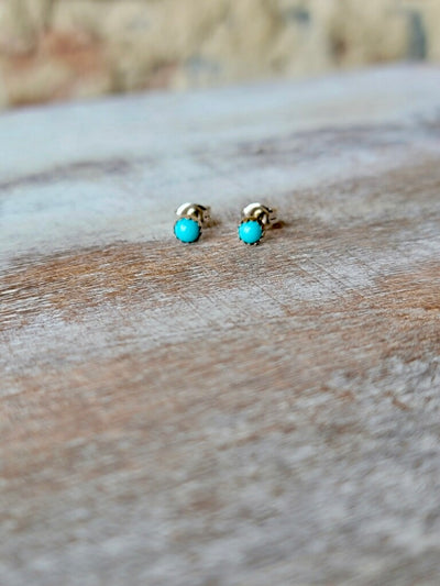 Close-up of Petite Turquoise Stud Earrings with Southwestern Charm available at Broker Leather.