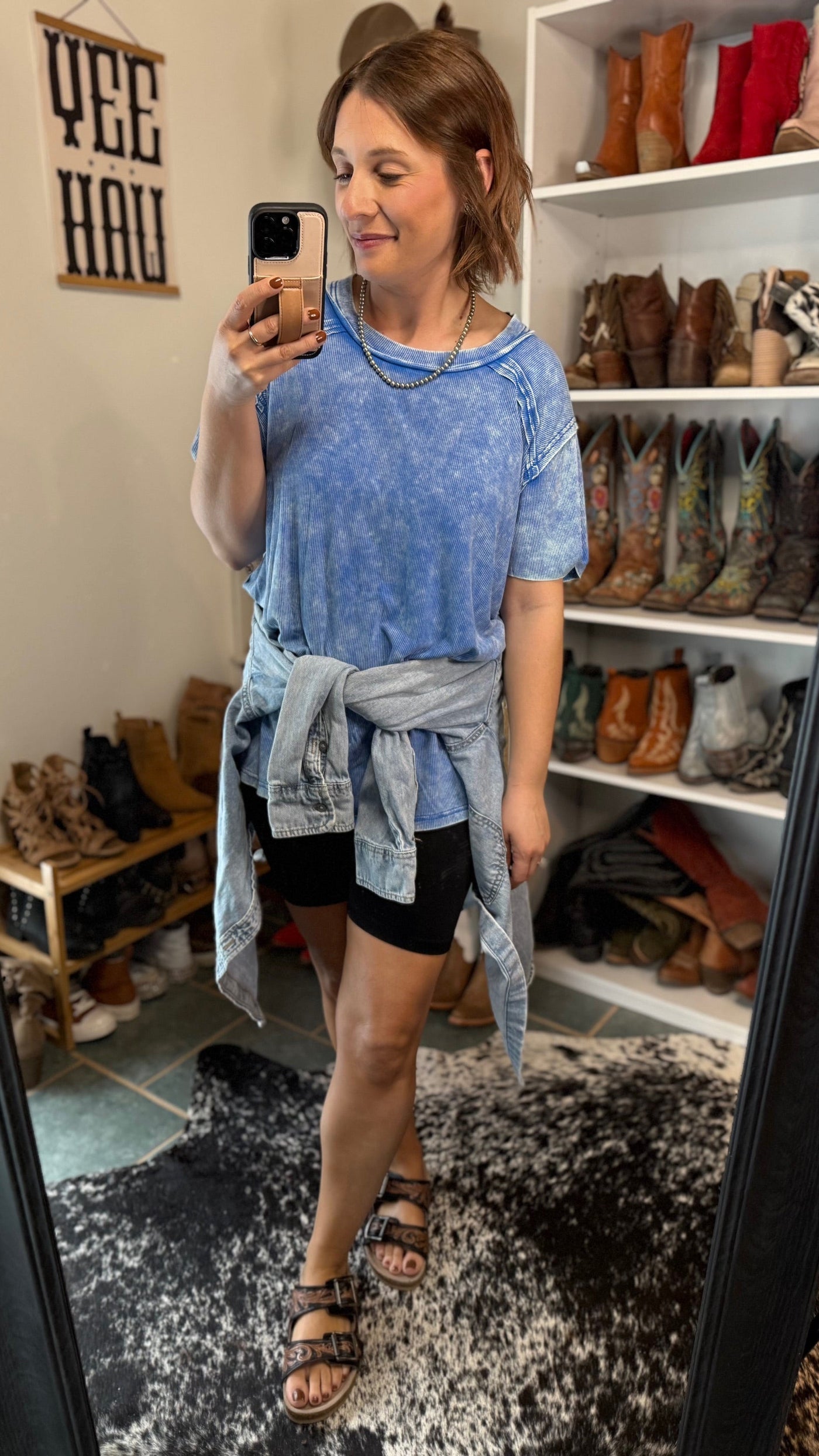 Ocean blue ribbed knit top with relaxed oversized fit.