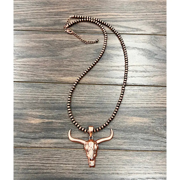 30-inch copper Navajo pearl necklace with a striking longhorn skull pendant.