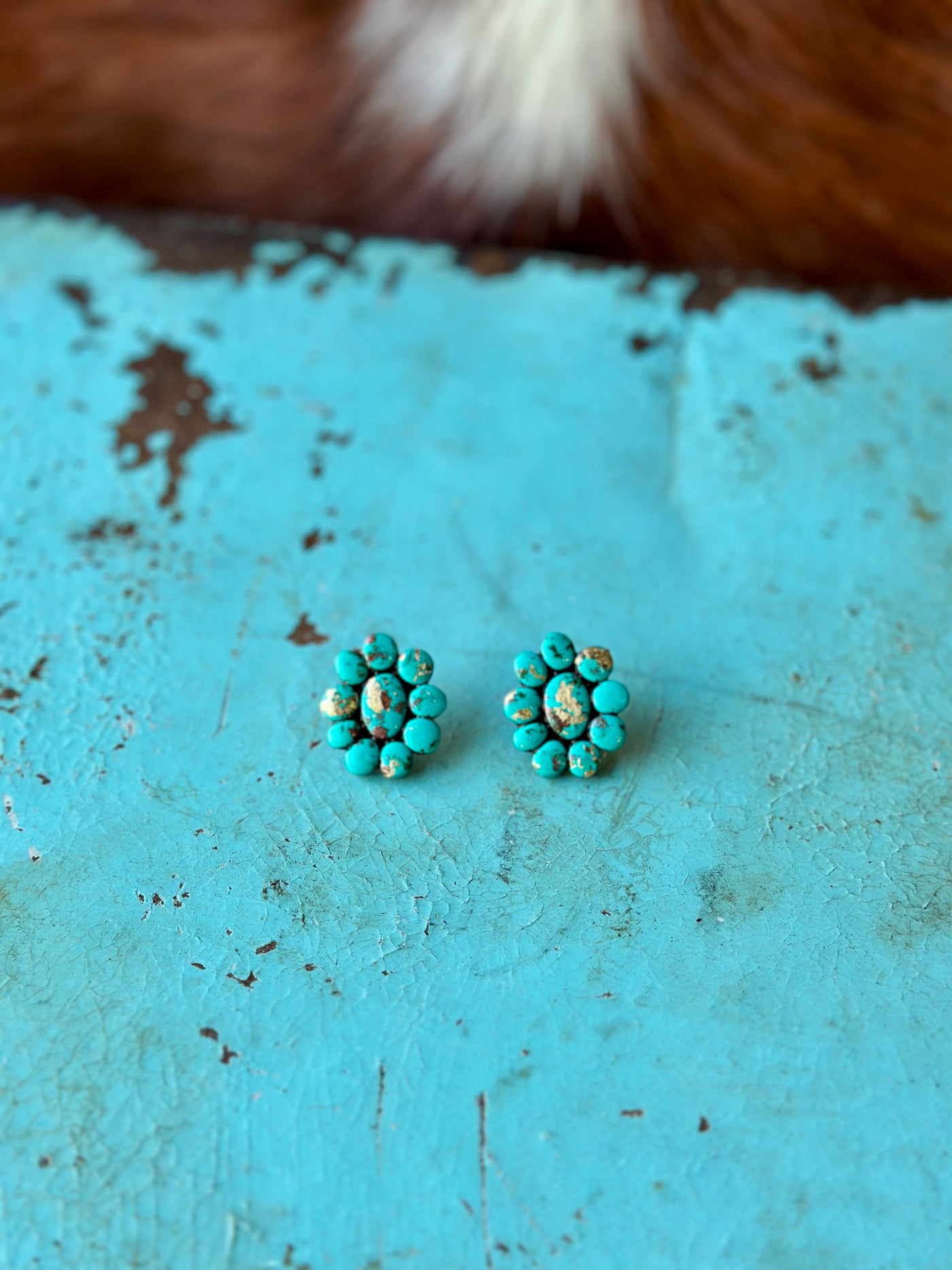 Side view of Fannie Turquoise Clay Cluster Earrings, showcasing intricate details and artisanal craftsmanship.