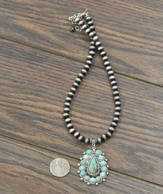 Western-style Jessica Turquoise Cluster Necklace, perfect for elevating casual and dressy looks alike.