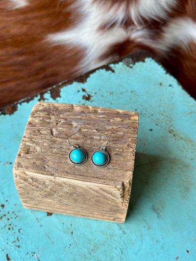 Simple Kayla Turquoise Dangle Earrings with turquoise stone and silver accent.