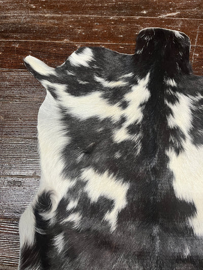 Close-up of the Keeaunna Black & White Goat Hide, perfect for decoration and function: coaster-free table protection.