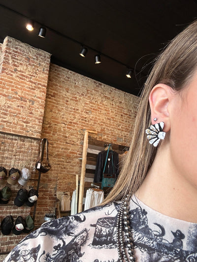 Model wearing the Kelcie Clay Cluster Earrings for size relevance, styled for a bold Western-inspired statement look.