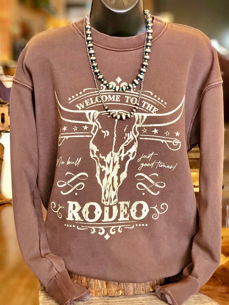 Comfortable and stylish brown sweatshirt for rodeo nights and casual wear.