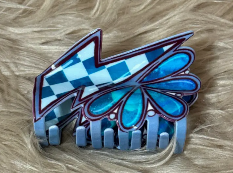 Close up stock photo of our Kylie Turquoise & Lightning Bolt Claw Clip.