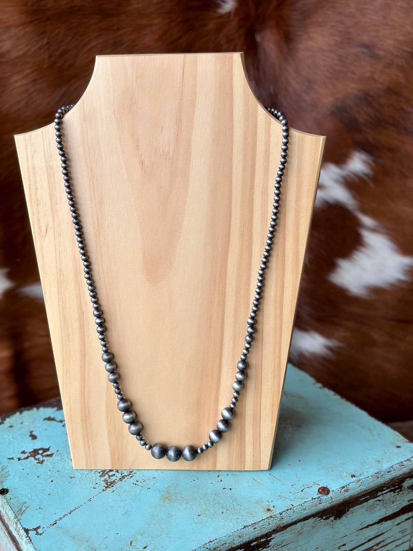 Lakin Navajo Pearl Necklace on display, a 30" long necklace with a 5" extender, offering a bold yet balanced look with faux Navajo beads.