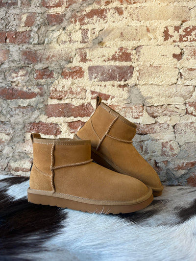 Side View of our Lamo Kora Moccasin Mini Boots.