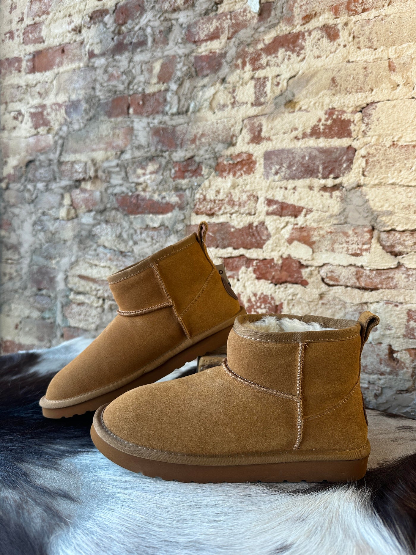 Another Side View of our Lamo Kora Moccasin Mini Boots.