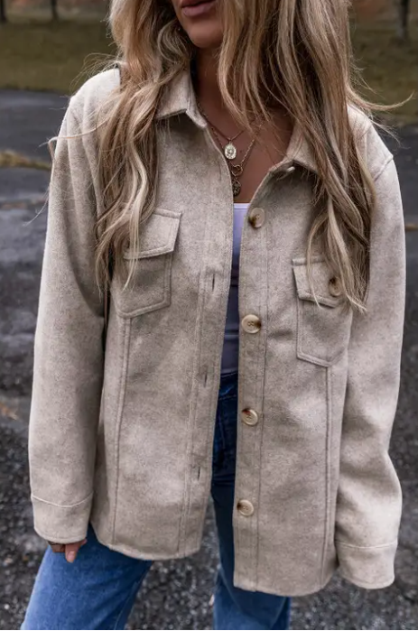 Model wearing the Latte Heathered Grey Button Up Shacket, showcasing its versatility as both streetwear and a cozy top layer.