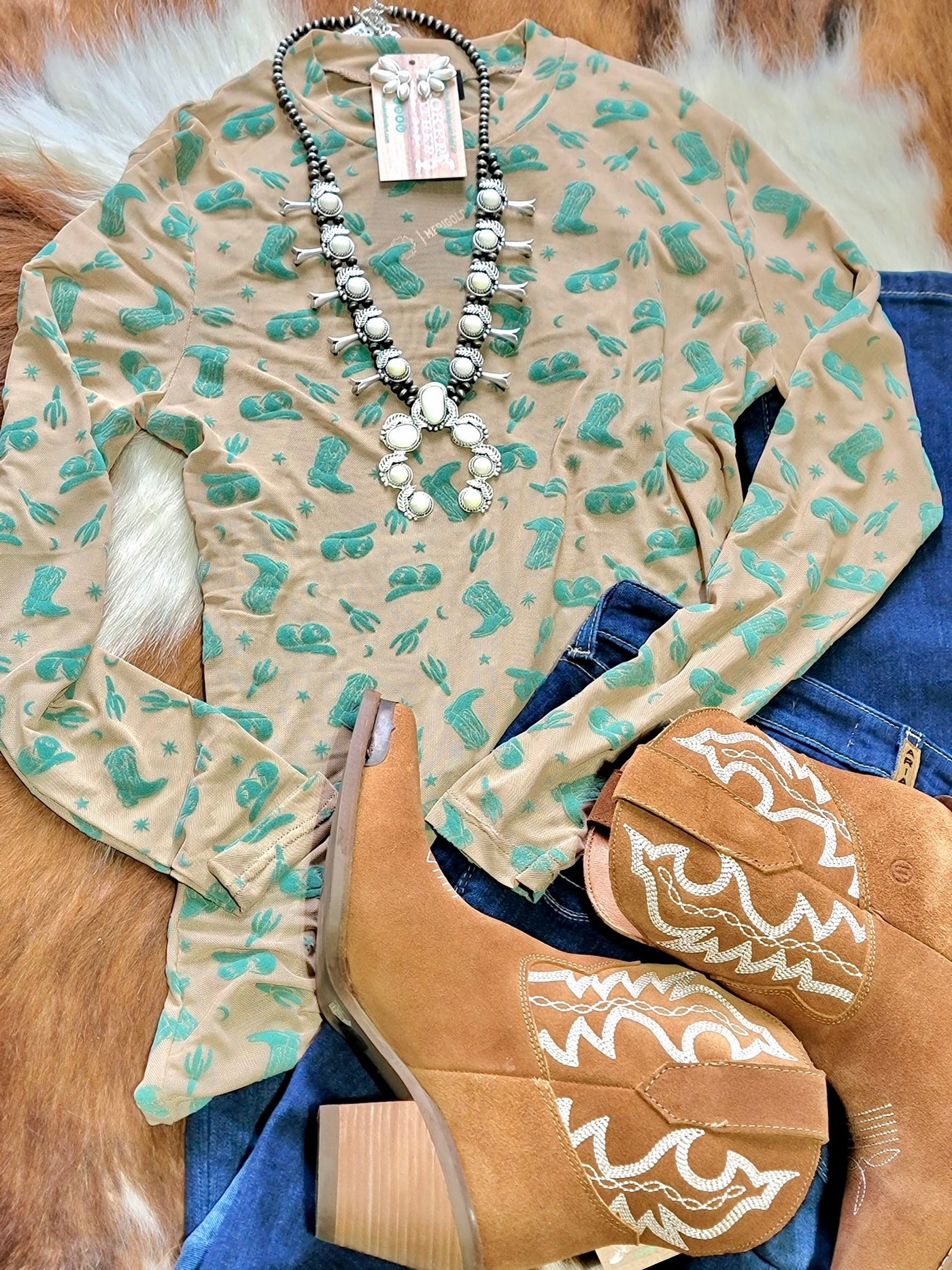 Lego Cowboy Boot & Cactus Mesh Top featuring a playful Western print of boots and cacti styled with a squash blossom necklace and boots.