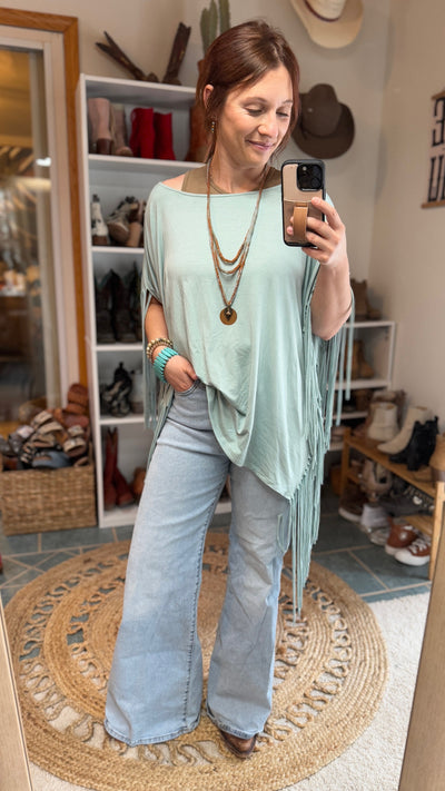 Broker Leather model in Lippy Fringe Top in casual outfit perfect for layering. 