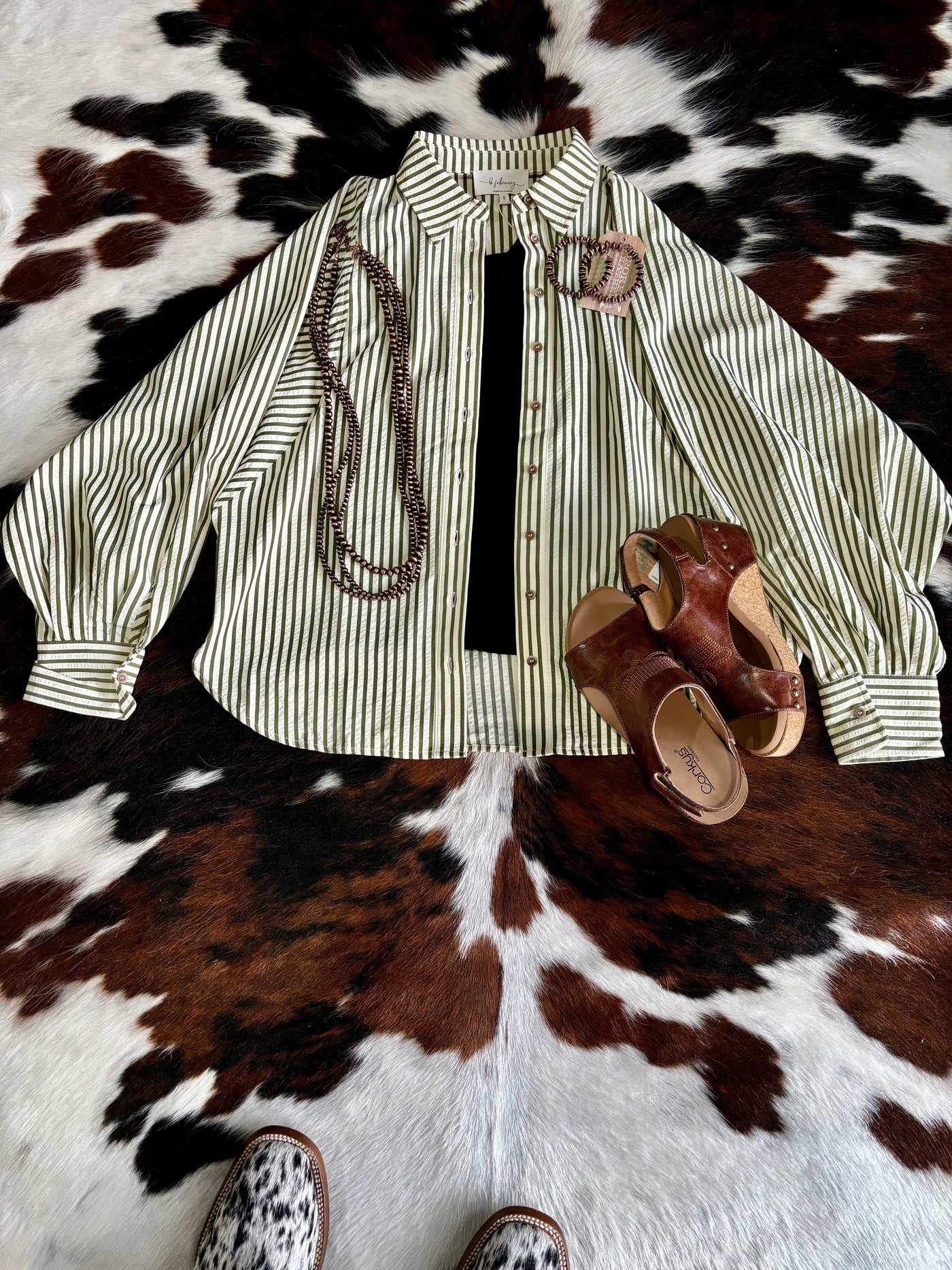 Flat lay outfit at Broker Leather of striped Mandy Button Down Shirt styled with rolled-up sleeves for a versatile, everyday outfit.