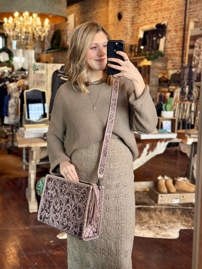 Mariella Tooled Leather Crossbody Bag – A genuine leather crossbody bag featuring intricate western-style tooling.