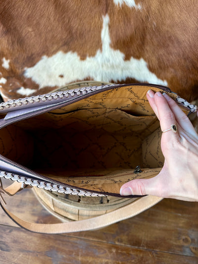 Interior of Mariella Leather Bag with Pockets – Open view showcasing the spacious interior with zippered and open pockets for organization.