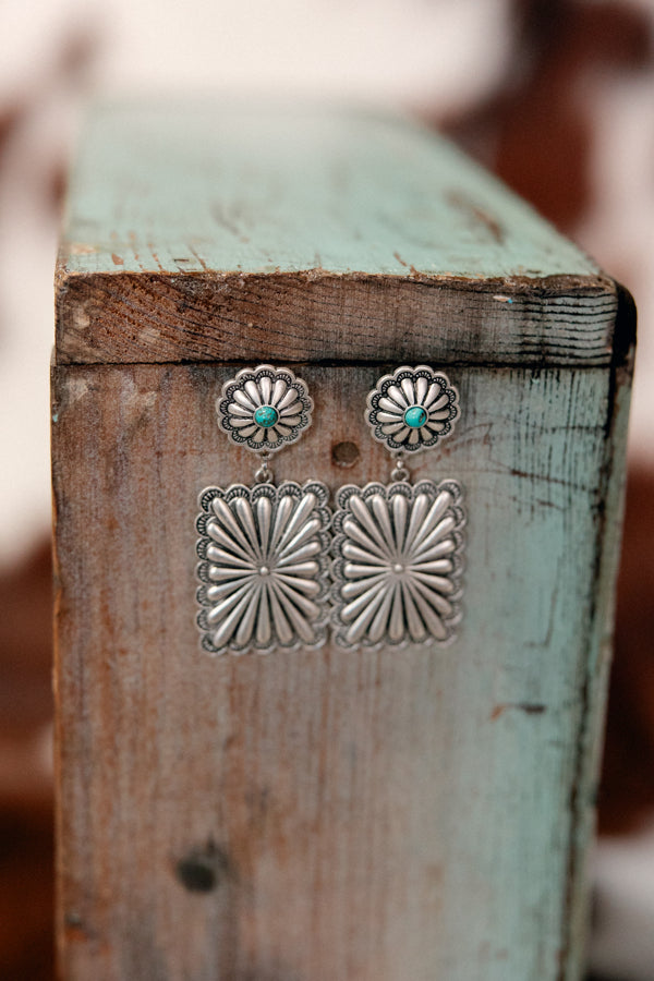 Marilyn Concho Post Earrings featuring a rectangular shape with a round concho detail, inspired by Marilyn Monroe's wisdom.