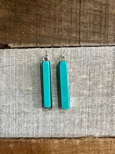 Close-up of the Marlowe Turquoise Bar Earrings showcasing the  bold silver bar design.