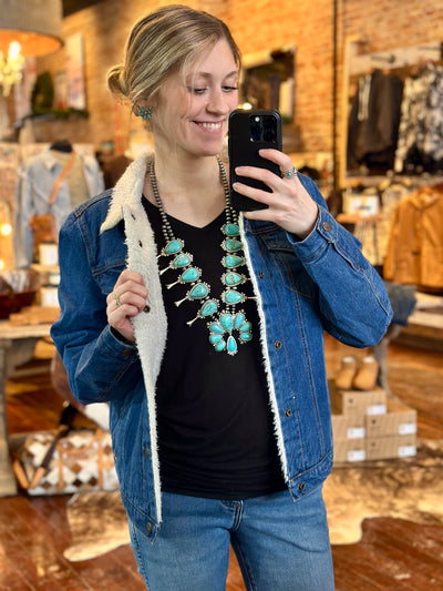 Iconic Marty Turquoise Squash Blossom Necklace shown as a versatile accessory for Western fashion.