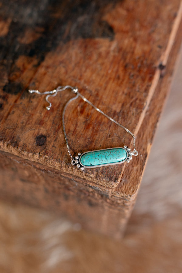 Faux turquoise stone on MaryJo Bracelet, featuring natural-looking color variations for a unique touch.