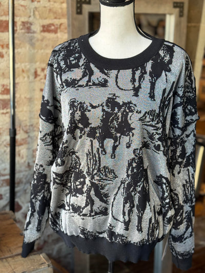 Reversible Mayfield Metallic Knit Sweater showcasing the bold black design on metallic silver background.