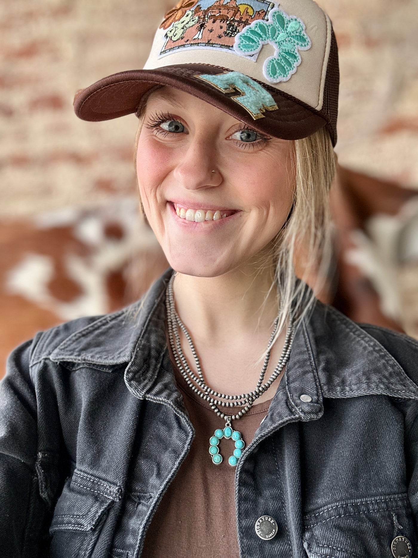 Broker Leather Model, Grace, wearing Mia Squash Turquoise Necklace, styled for a bold Western-inspired statement look.