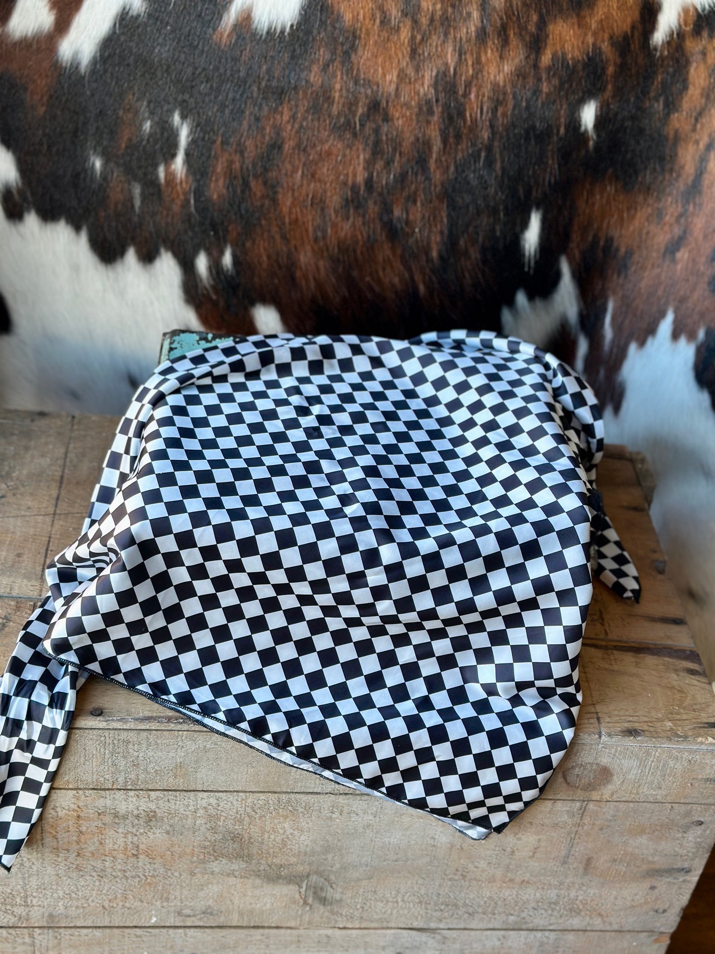 Black and white checkered pattern reminiscent of speedway flags.