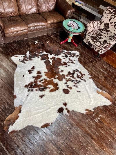 Authentic western-style Mountain Breeze Cowhide Rug on sale for 30% off at Broker Leather.