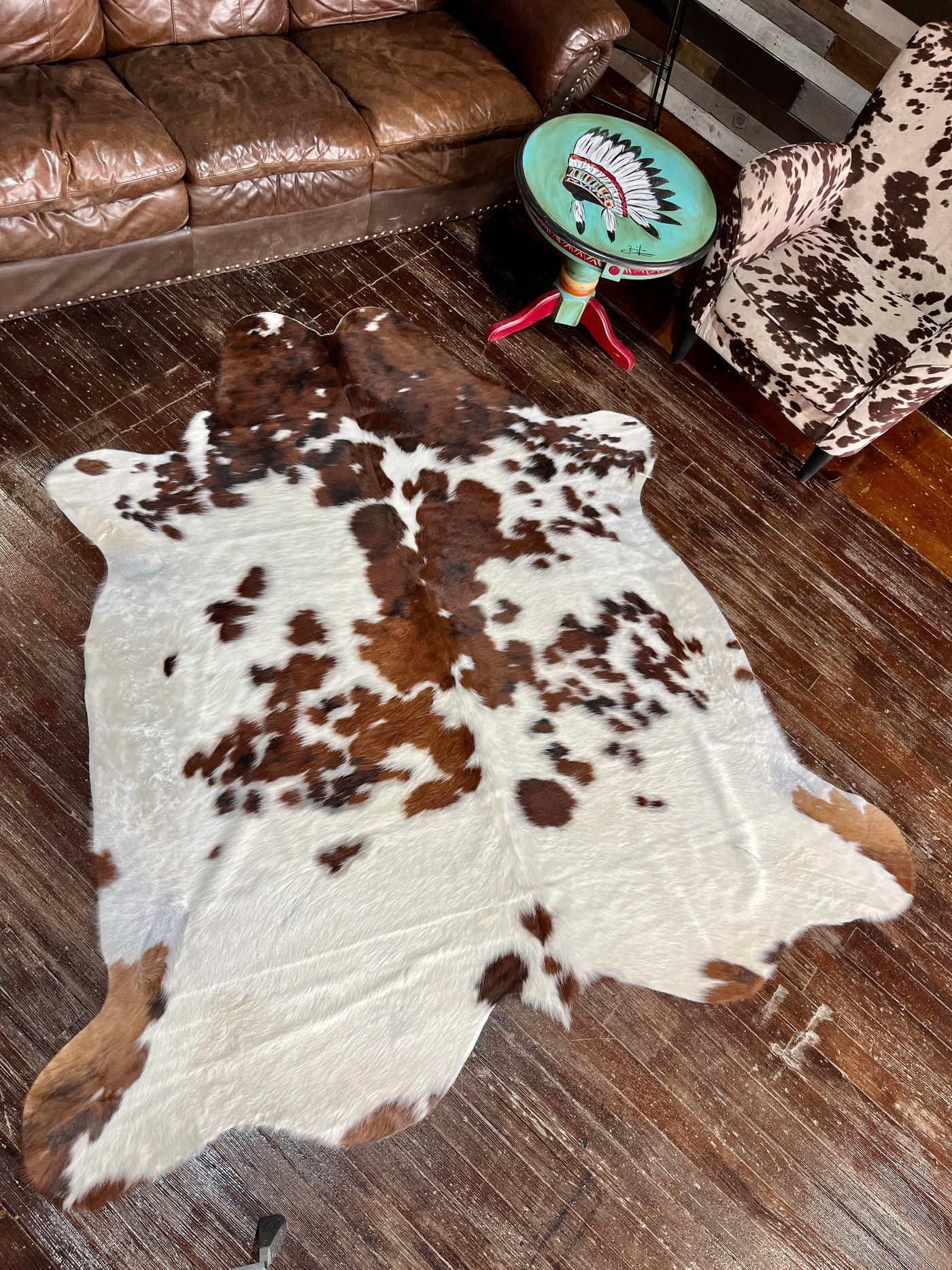 Genuine cowhide rug with a unique western-inspired pattern on sale now at Broker Leather in Waukon, Iowa.