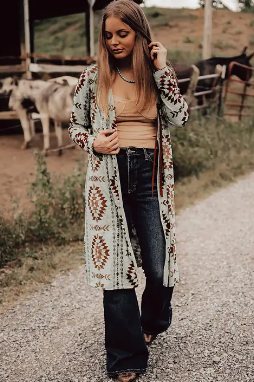 Stock image of a woman modeling our Muscadine Aztec Open Front Long Cardigan.