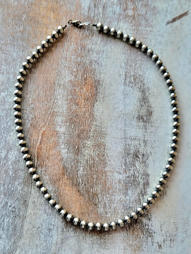 Handcrafted 18-inch Navajo Pearl Necklace with heirloom-quality sterling silver beads.