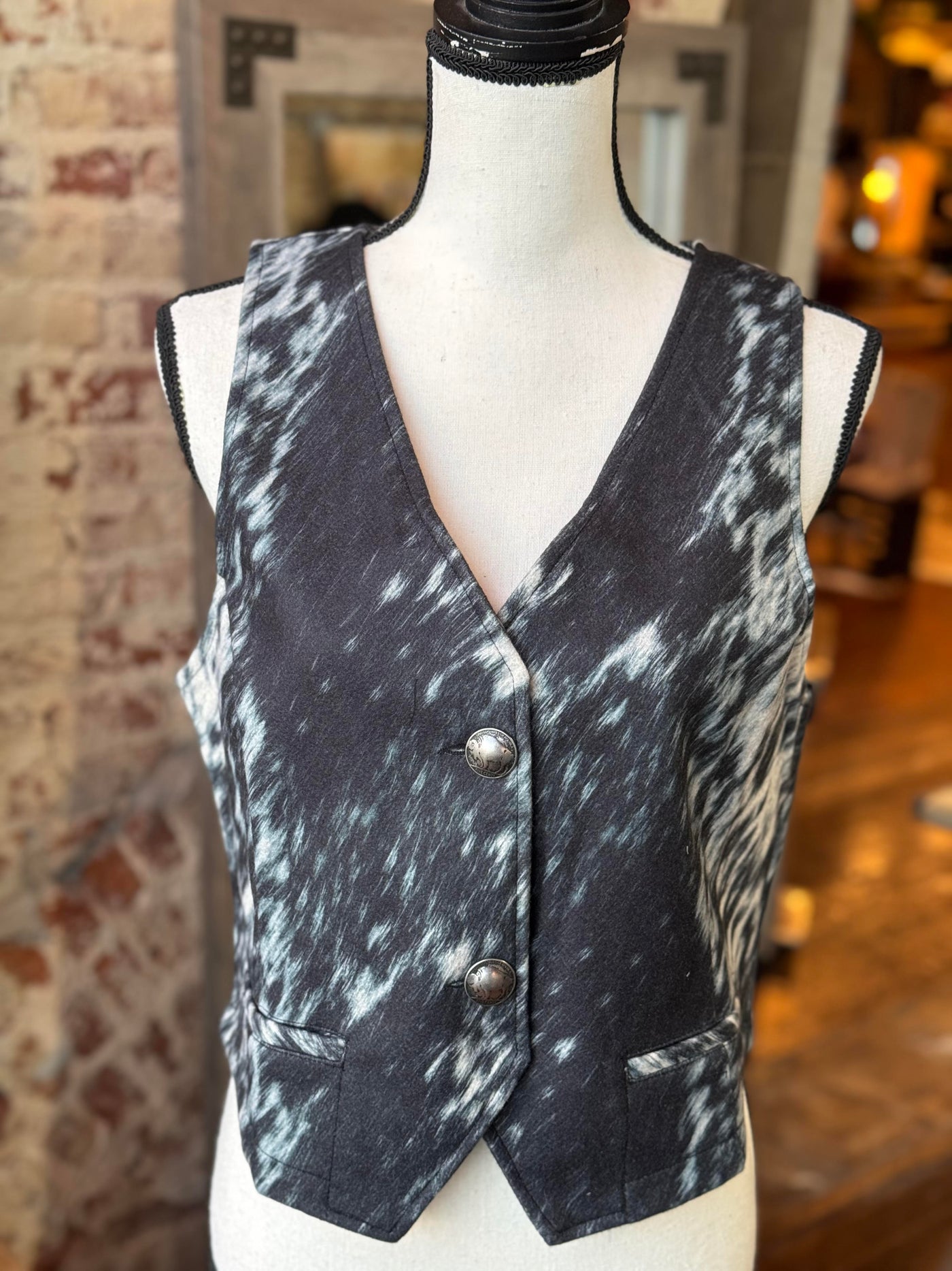 Broker Leather's Open Gate S&P Cowhide Vest shown on a mannequin boasts NFR-worthy style.