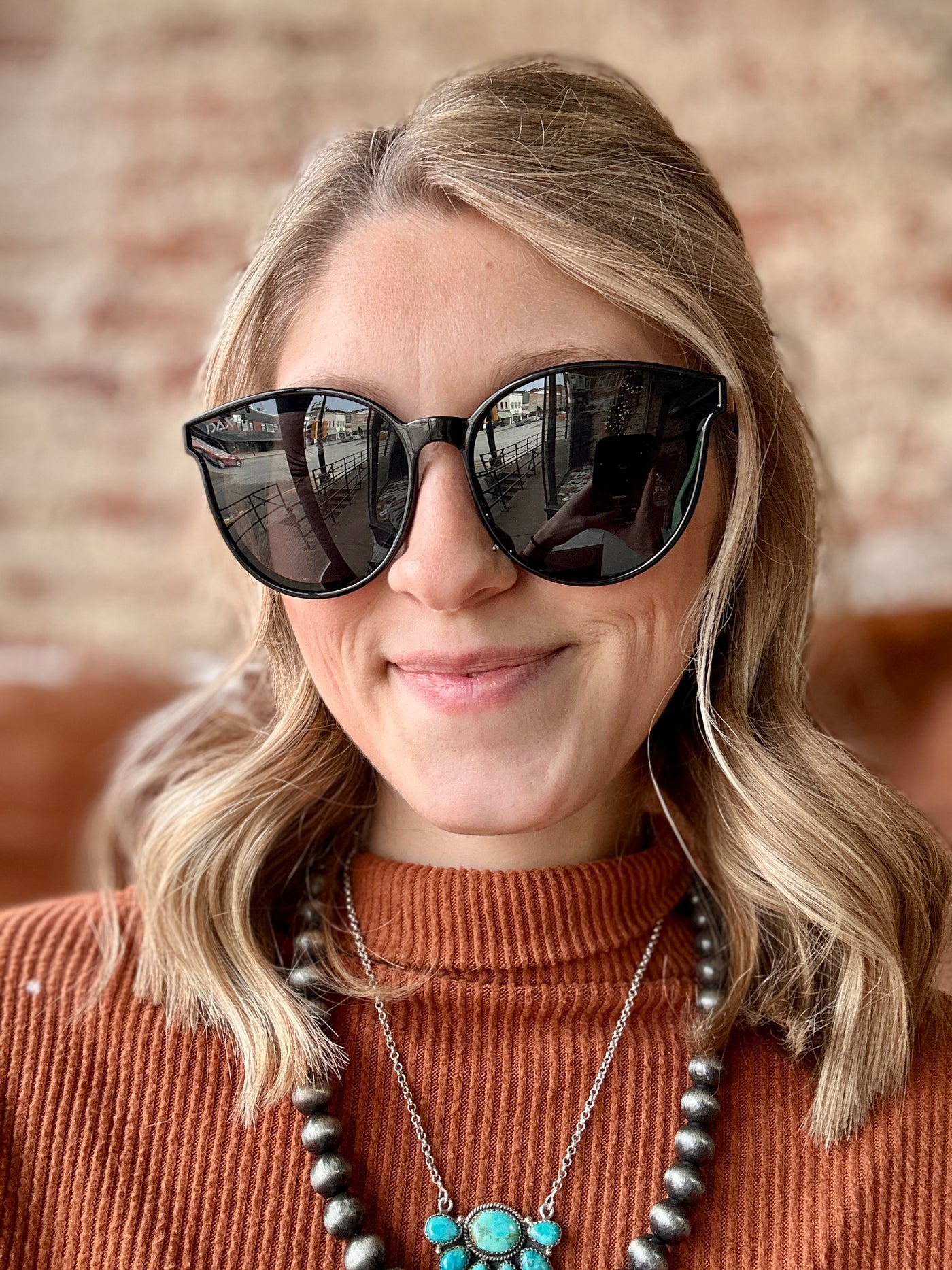 Sleek black sunglasses designed for country concerts.