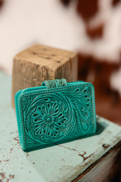 Handcrafted genuine leather cardholder in a timeless floral design.