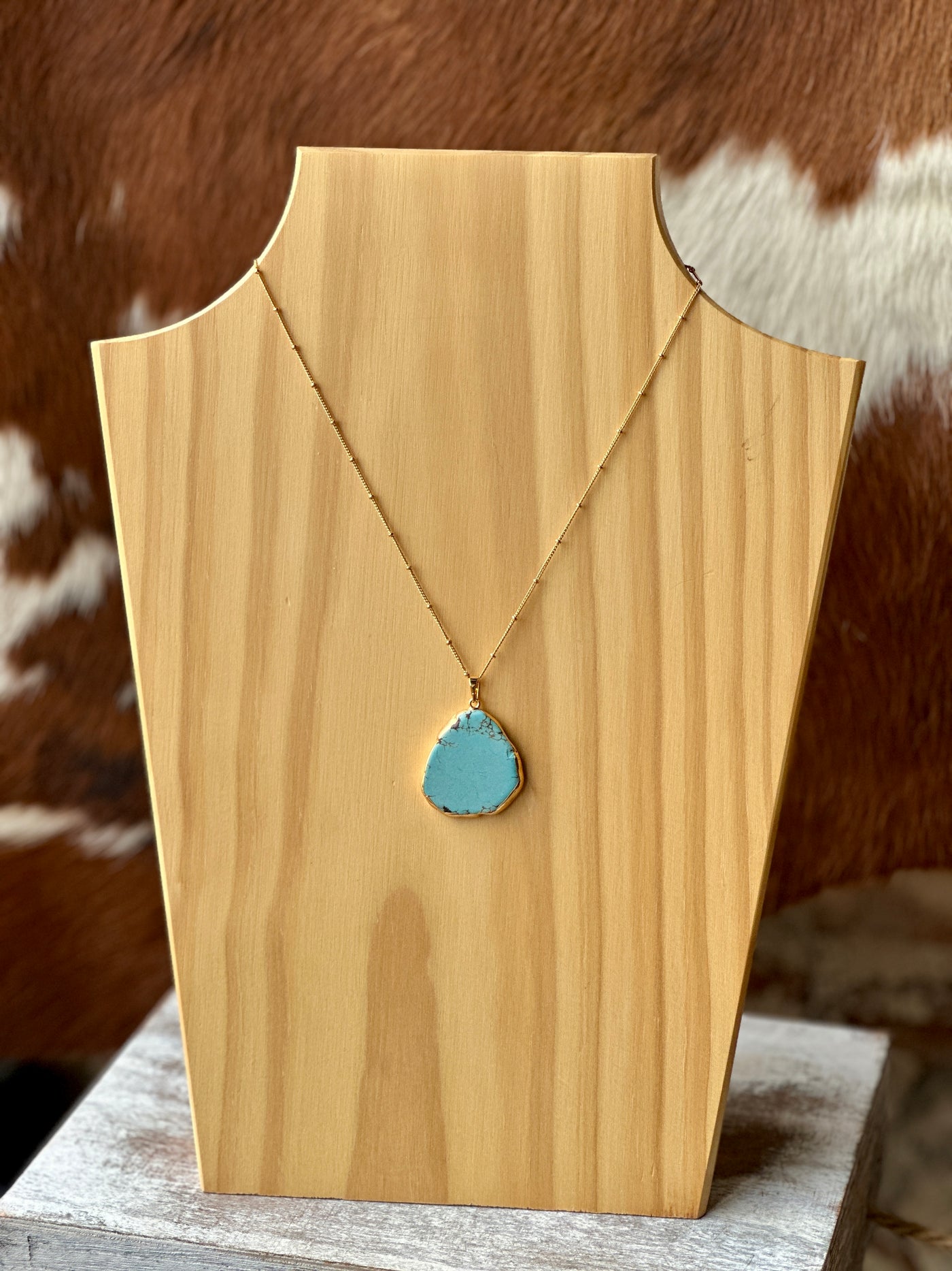 Pendl Turquoise Stone Pendant Gold Necklace with an 18” ball chain.