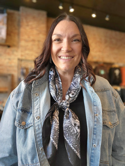 Woman modeling our Postal Service Black & White Paisley Wild Rag.