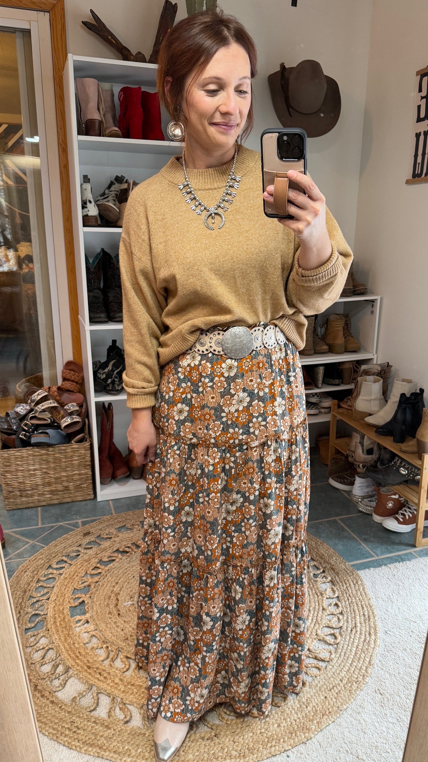 Effortlessly stylish floral maxi skirt in beige with subtle bohemian charm paired with accessories by Broker Leather Model.