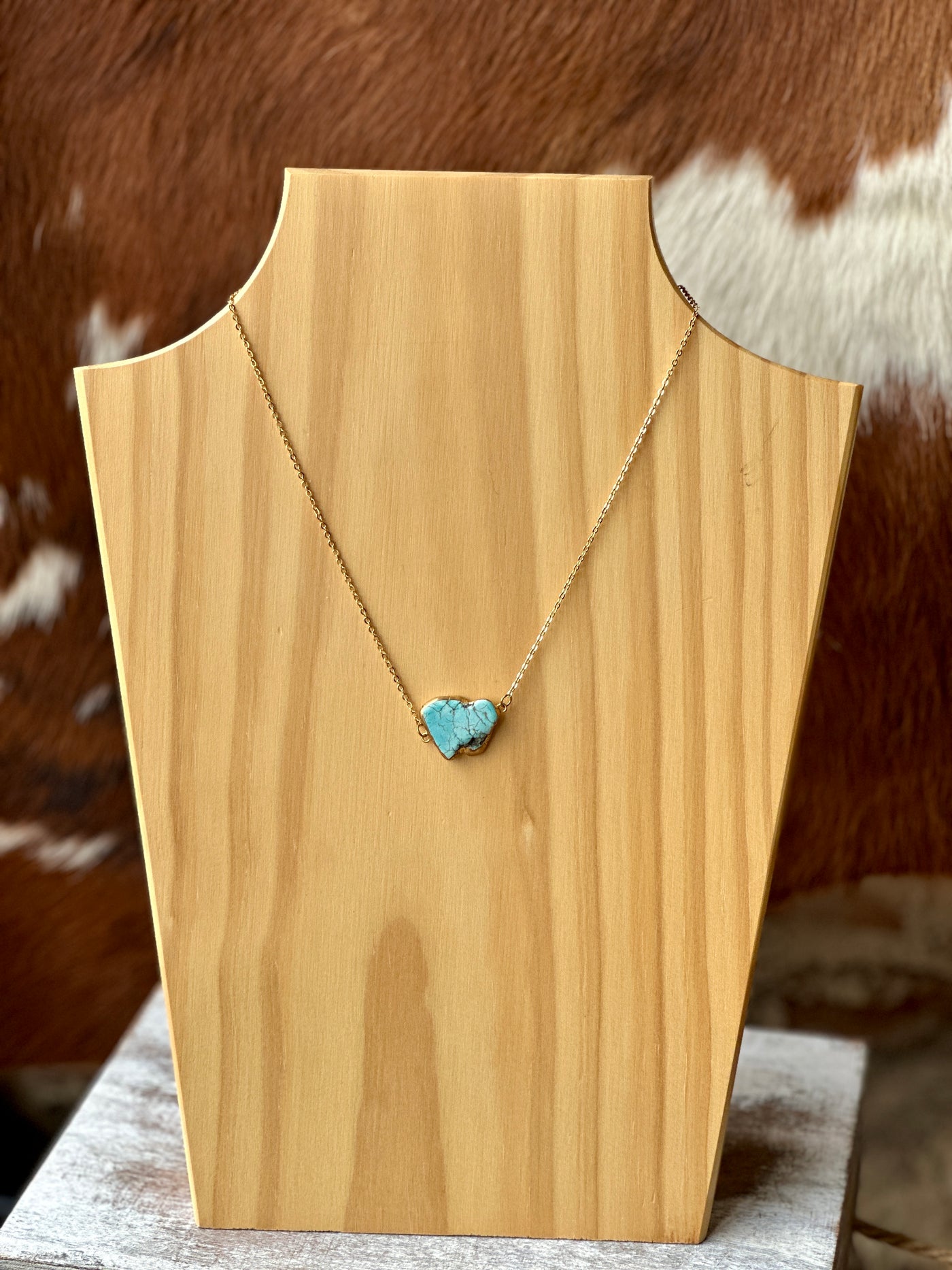 Reiner Faux Turquoise Necklace – 1-inch x ¾-inch pendant with natural marbling variations.