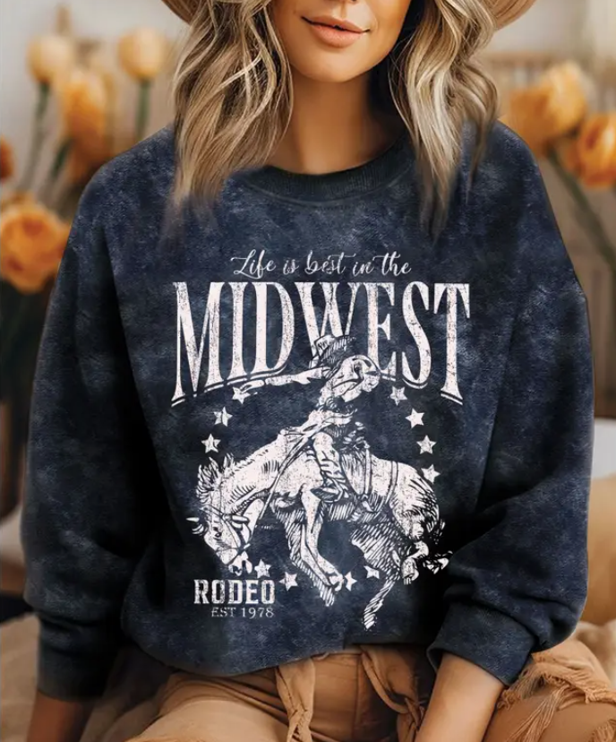 Stock photo of woman modeling our Ria Midwest Rodeo Crewneck [Black & White].