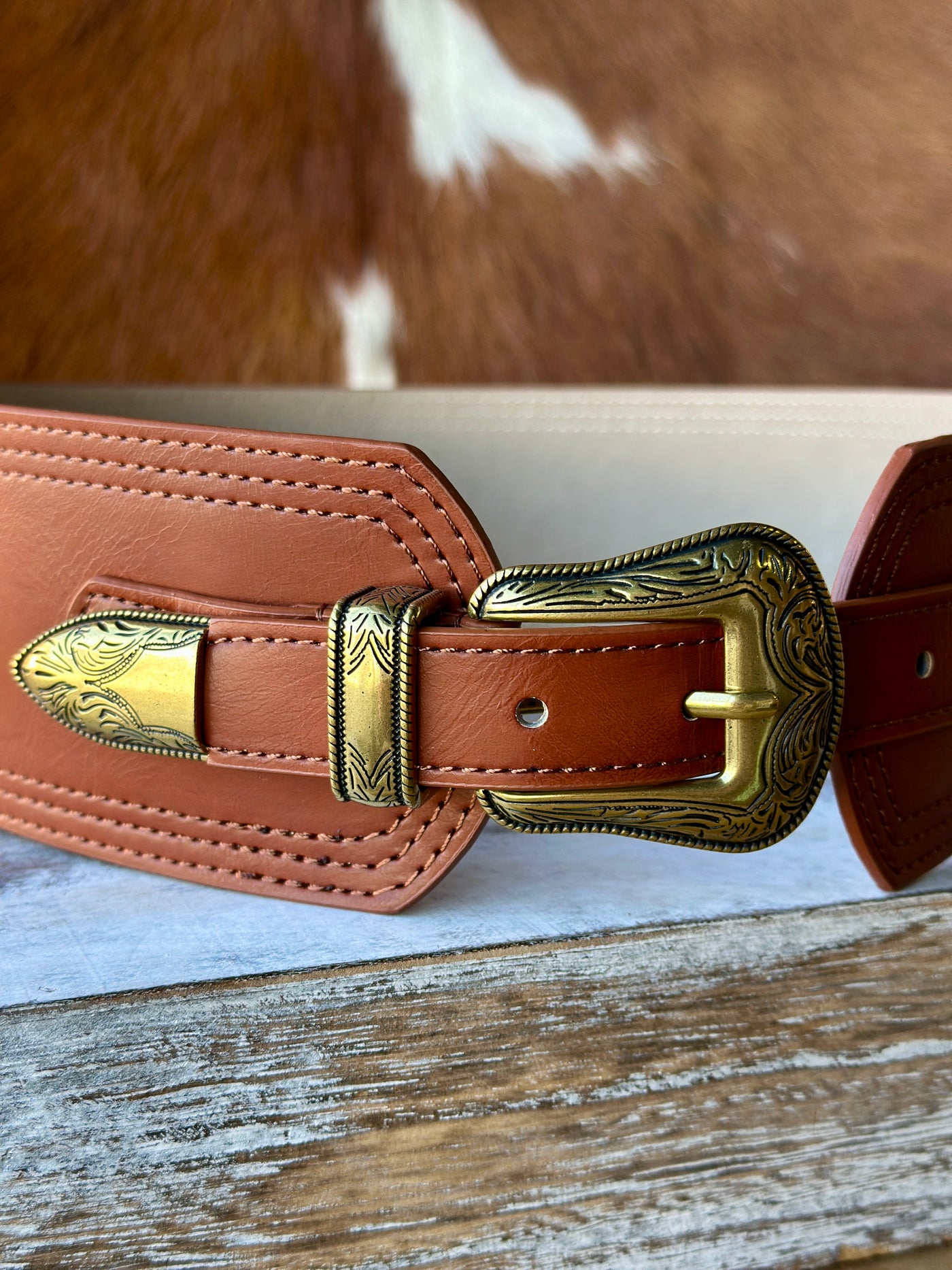 Stylish Richelle Corset Belt in Tan, made from high-quality leather with a buckle closure for easy adjustability.