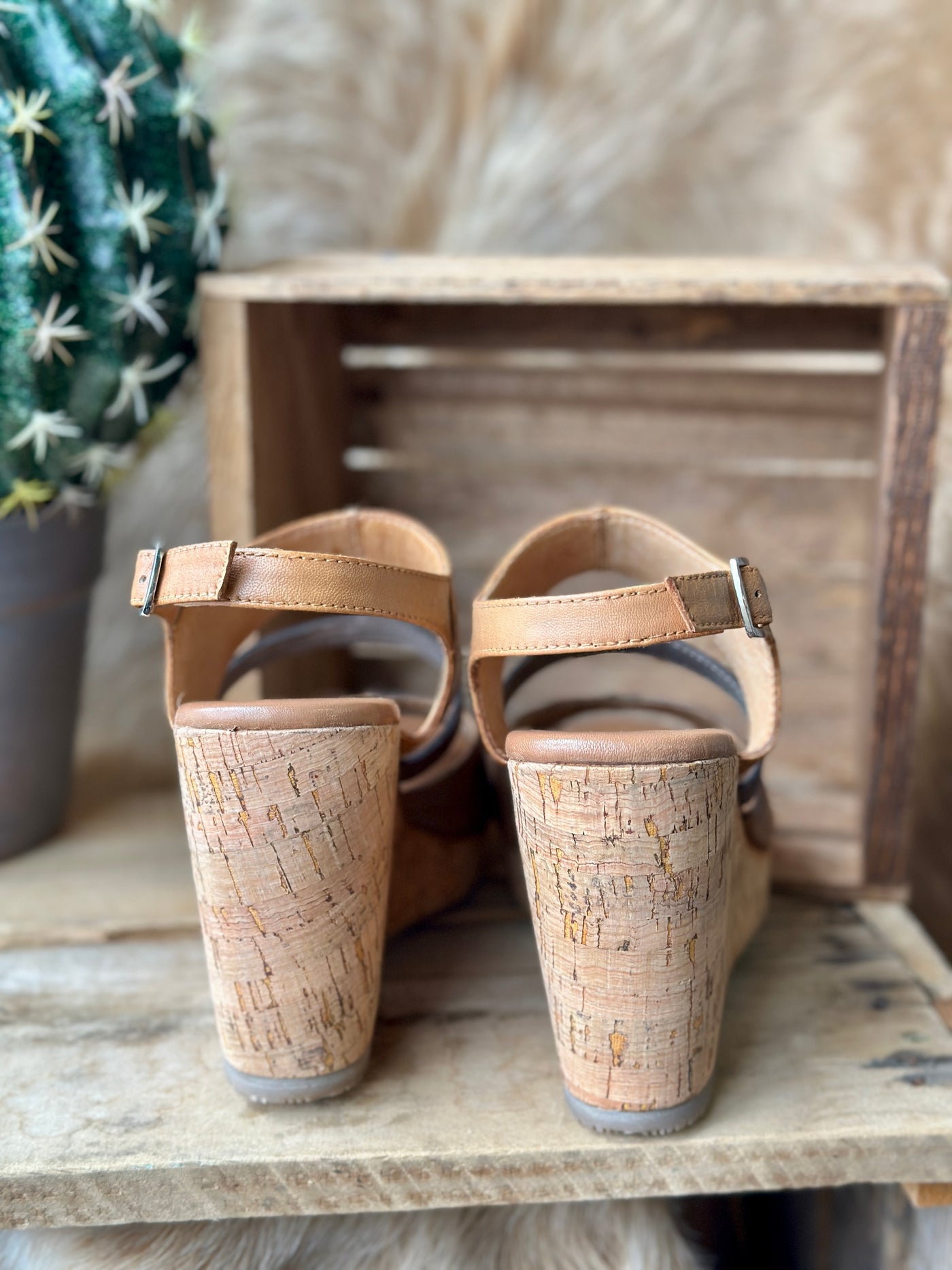 Back view of Roan Decorum Wedge Sandals highlighting cork heel and ankle strap support