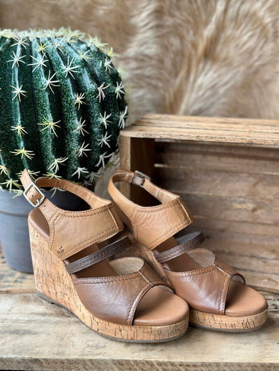 Roan by Bed|Stu Decorum Wedge Sandals showing mixed leather tones and wedge height