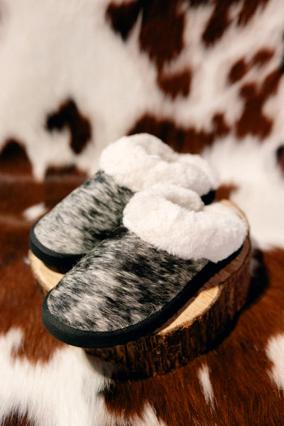 Ryggen Genuine Cowhide Slippers featuring plush pile lining and soft, cozy cowhide exterior.