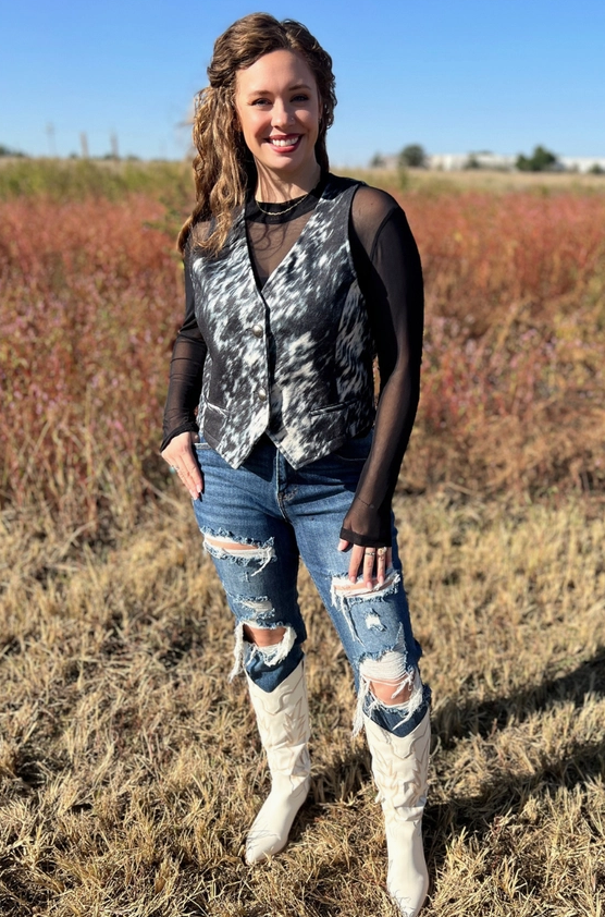 Broker Leather's Open Gate S&P Cowhide Vest as shown on a Western model.