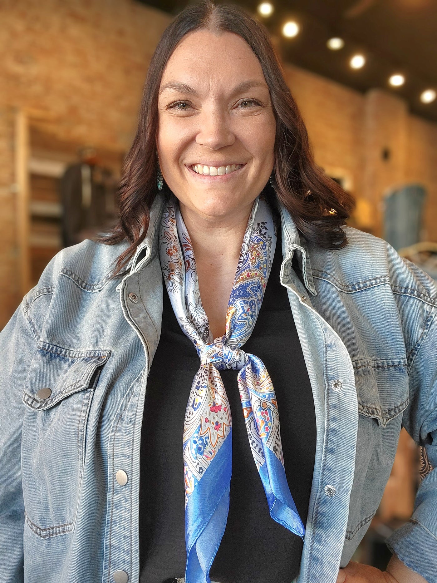 Woman modeling our Shaley Blue Paisley Wild Rag.