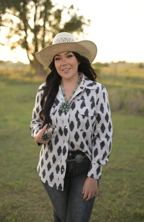 Close-up of the classic pearl snap closures on the Sheila top, adding authentic Western charm.